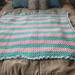 Crocheted baby blanket aqua and pink